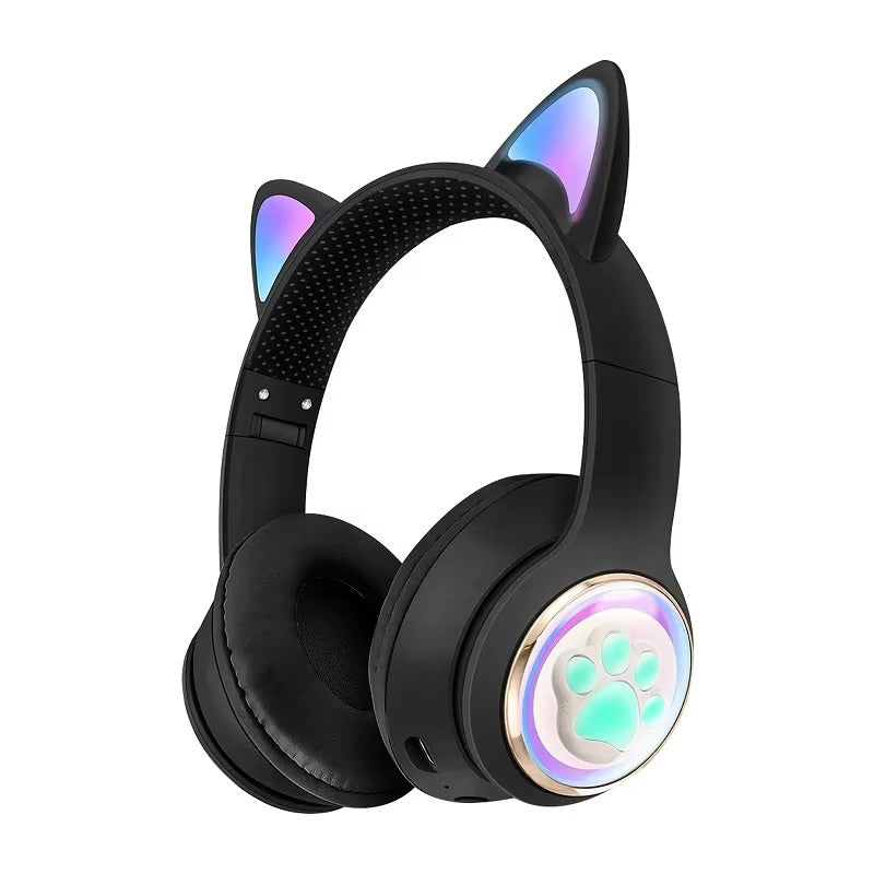 Black headphones with cat ears and a paw design on a white background