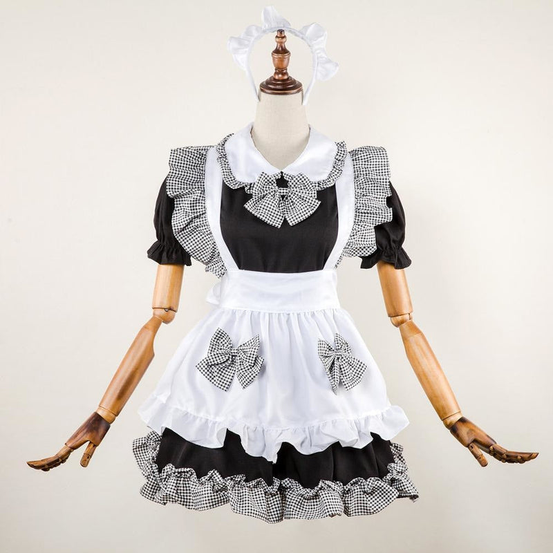 French maid cosplay: black and white ruffled dress, white apron, gingham bows for DDLG playground