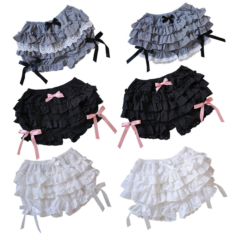 Ruffled bloomers or diaper covers in different colors and patterns with decorative bows.