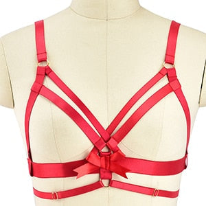 Red strappy harness-style bra or lingerie top.