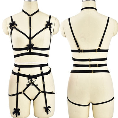 Strappy black harness-style lingerie set displayed on a mannequin torso.
